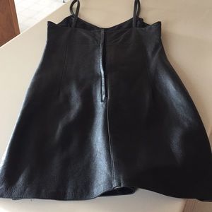 Black leather back zip leather dress.